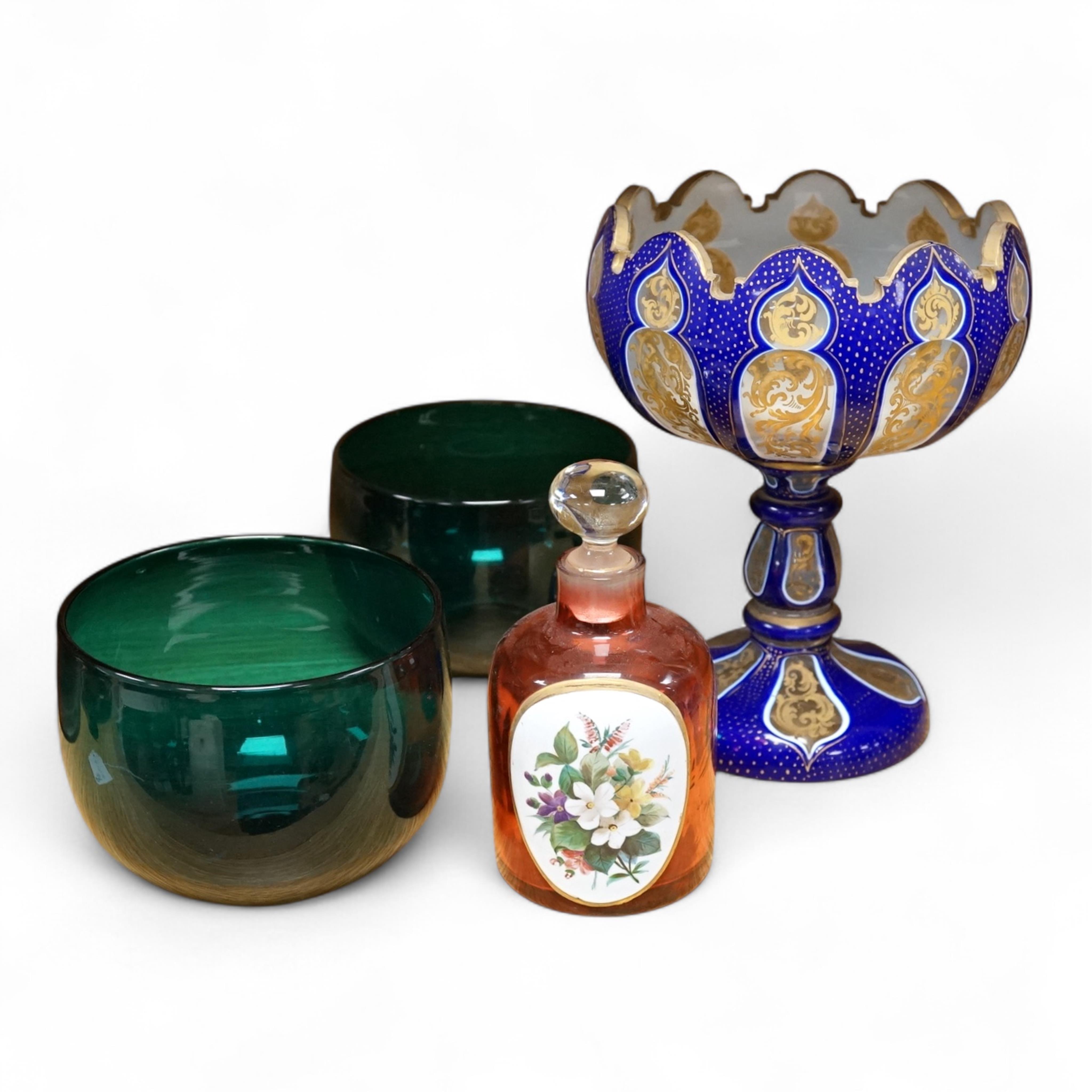 A pair of 19th century green glass fingerbowls, a Bohemian blue overlaid glass vase and a ruby glass scent bottle, largest 20cm high
